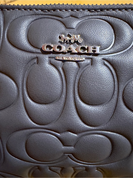 Coach Handbags - Coach Black Embossed Signature Leather wristlets Bag